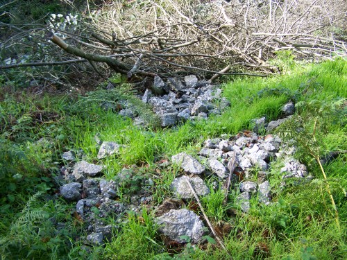 Verquido de cascallos de obra.