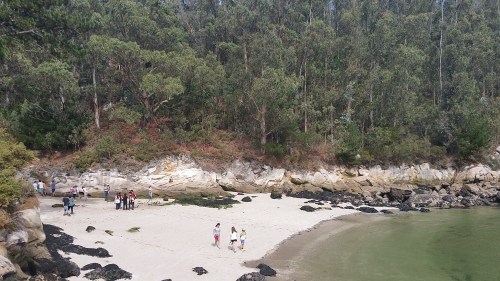 Praia a carón do faro